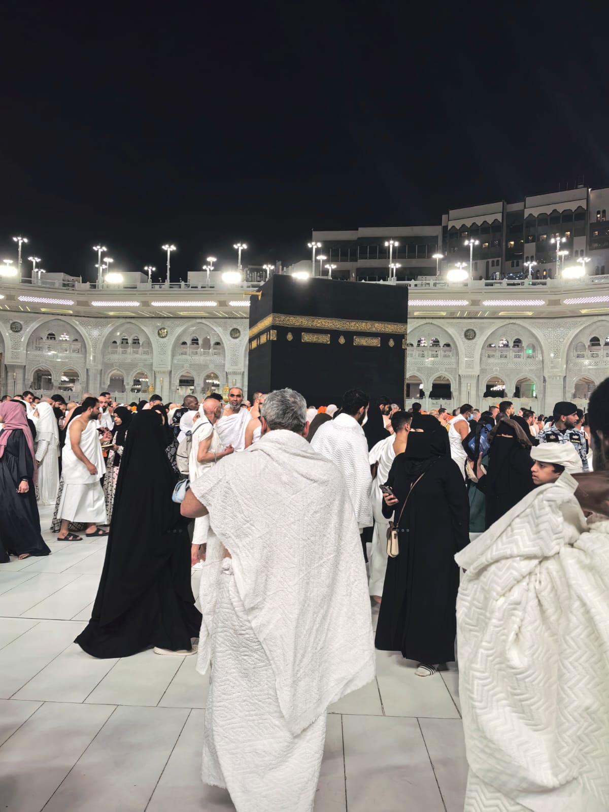 Pilgrims performing Tawaf around the Kaaba